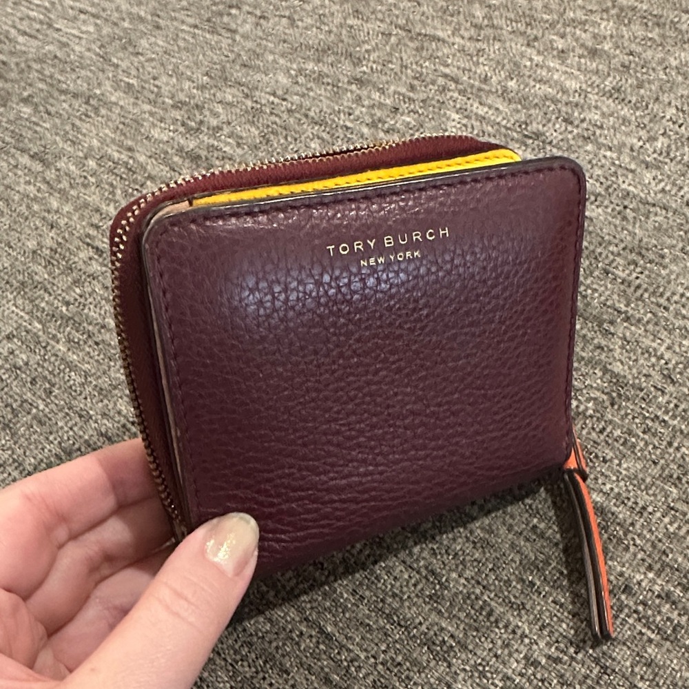 Tory Burch Pebbled Leather Zip Wallet in Burgundy with Yellow Accent